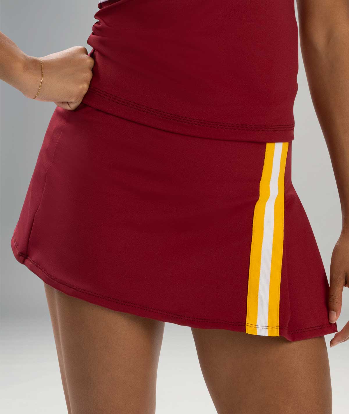 GK Spirit Asymmetrical Pleated Skirt with Taping Detail